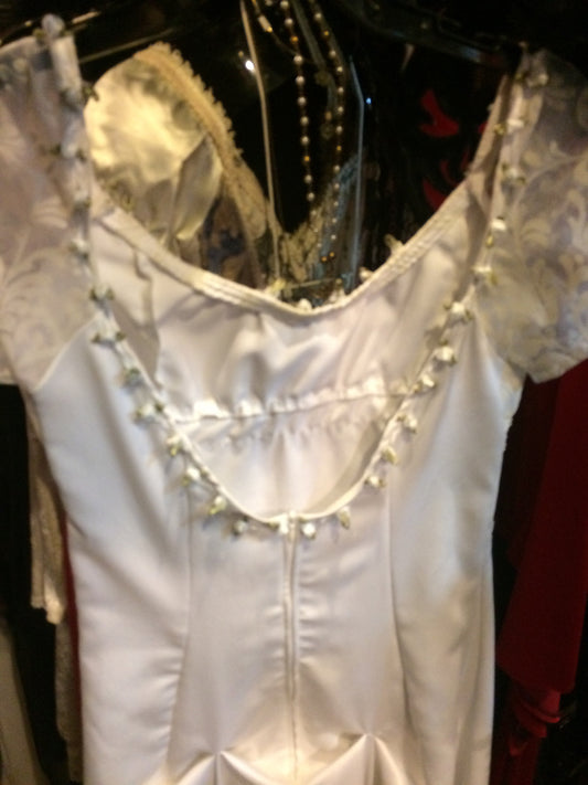 White gown green trim