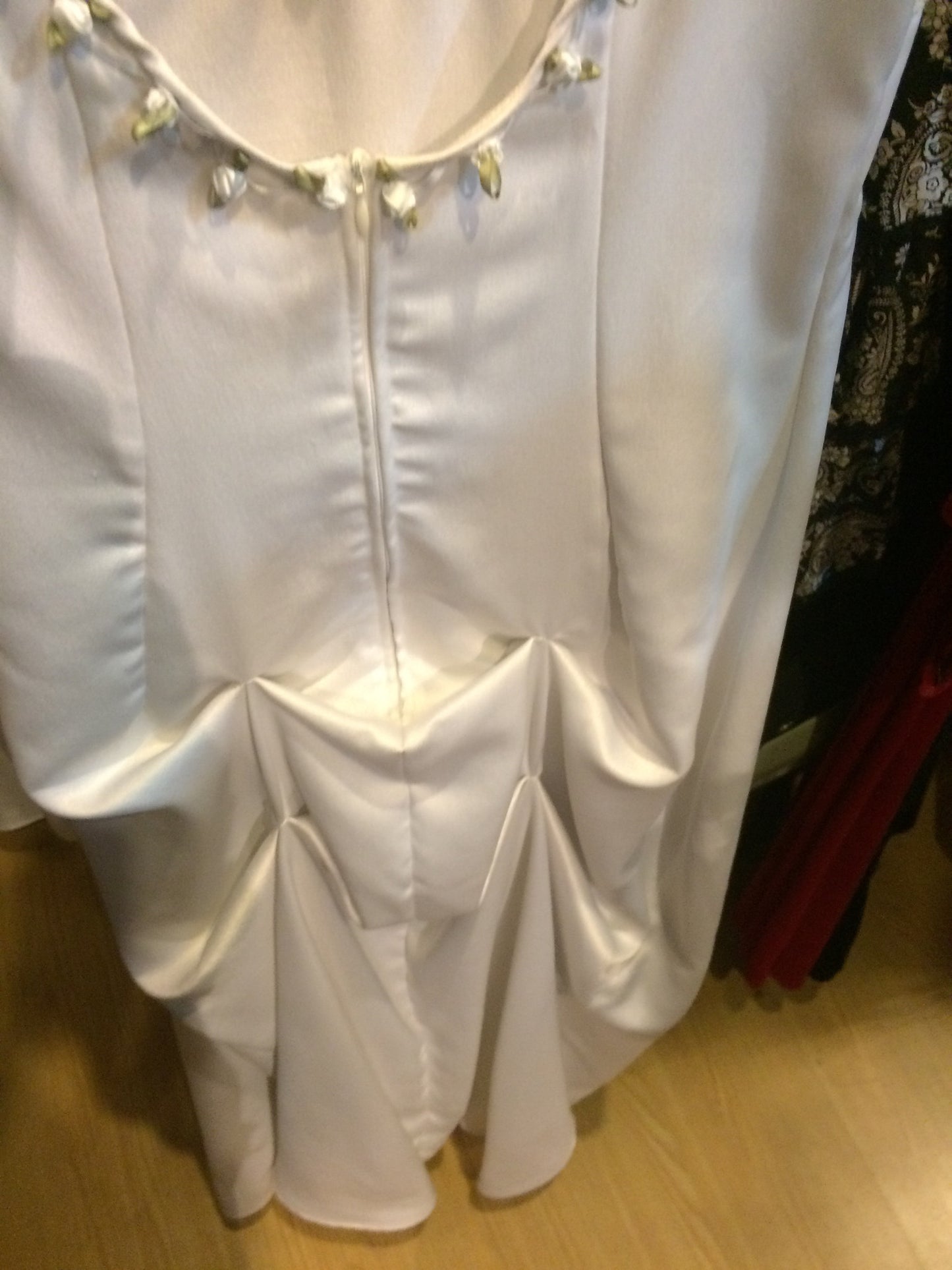 White gown green trim