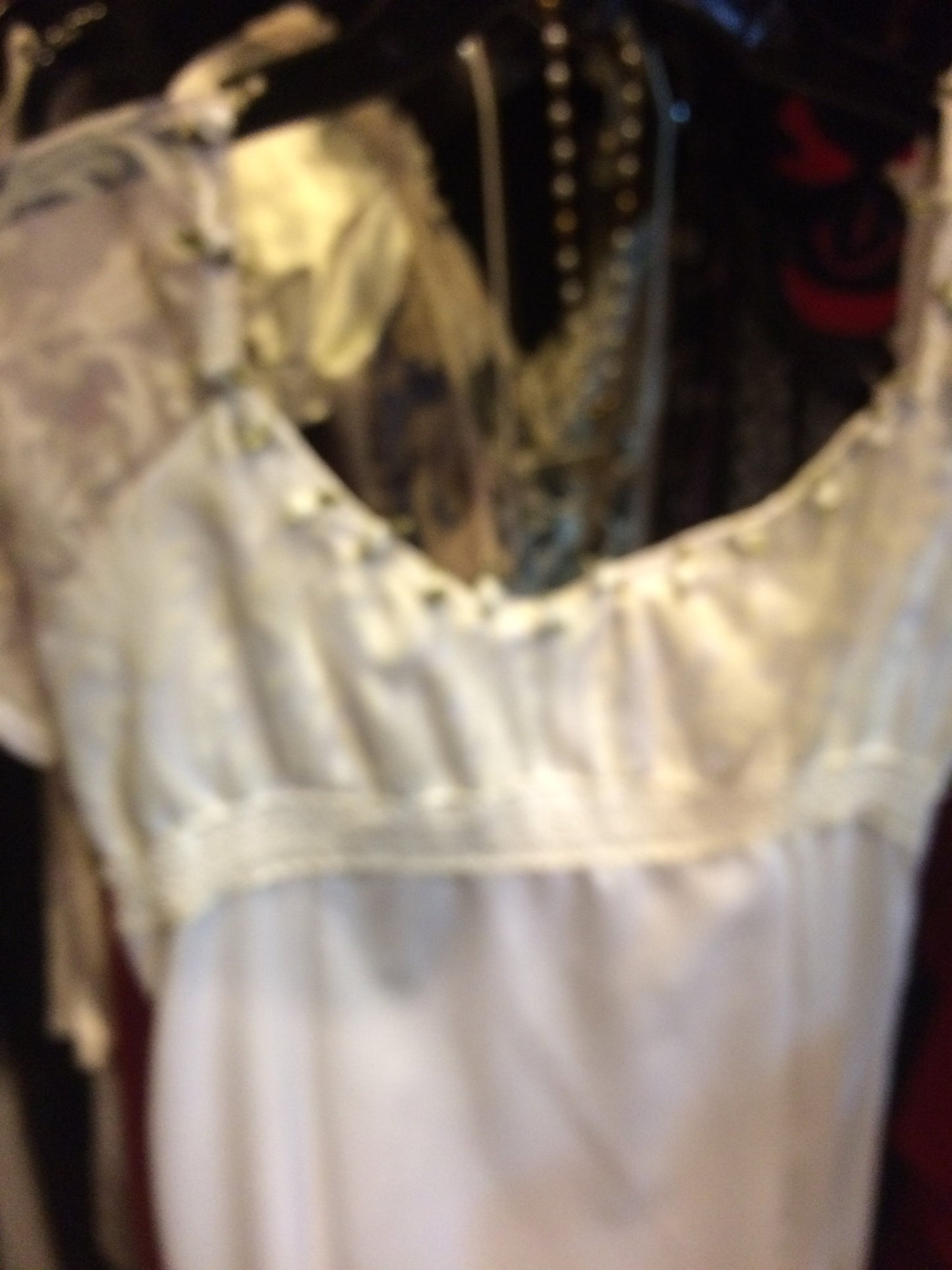 White gown green trim