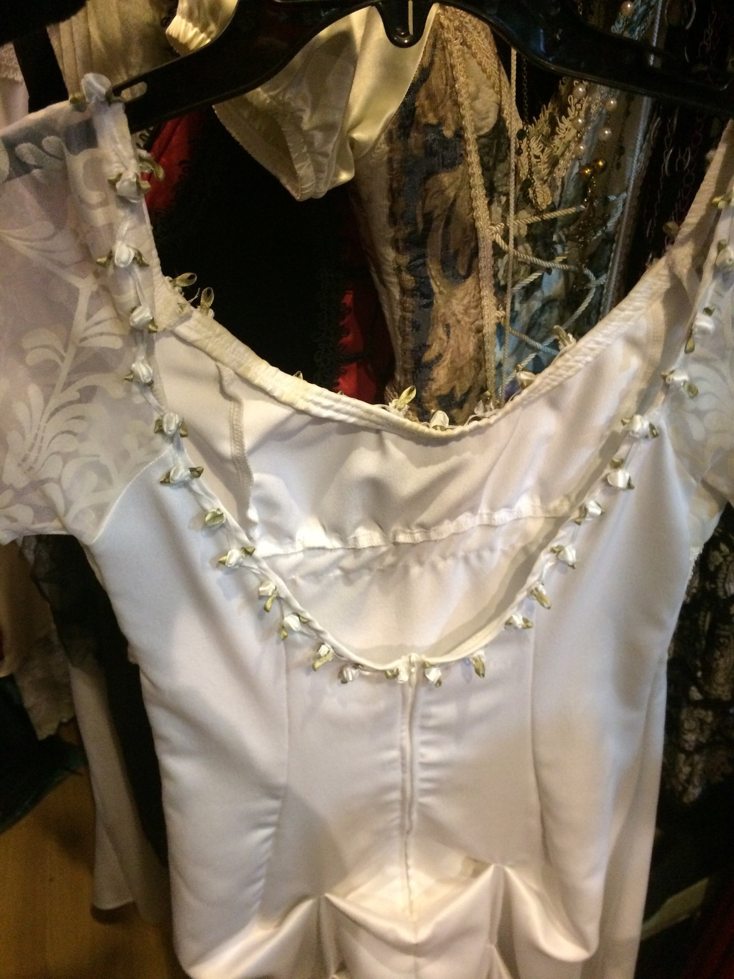 White gown green trim
