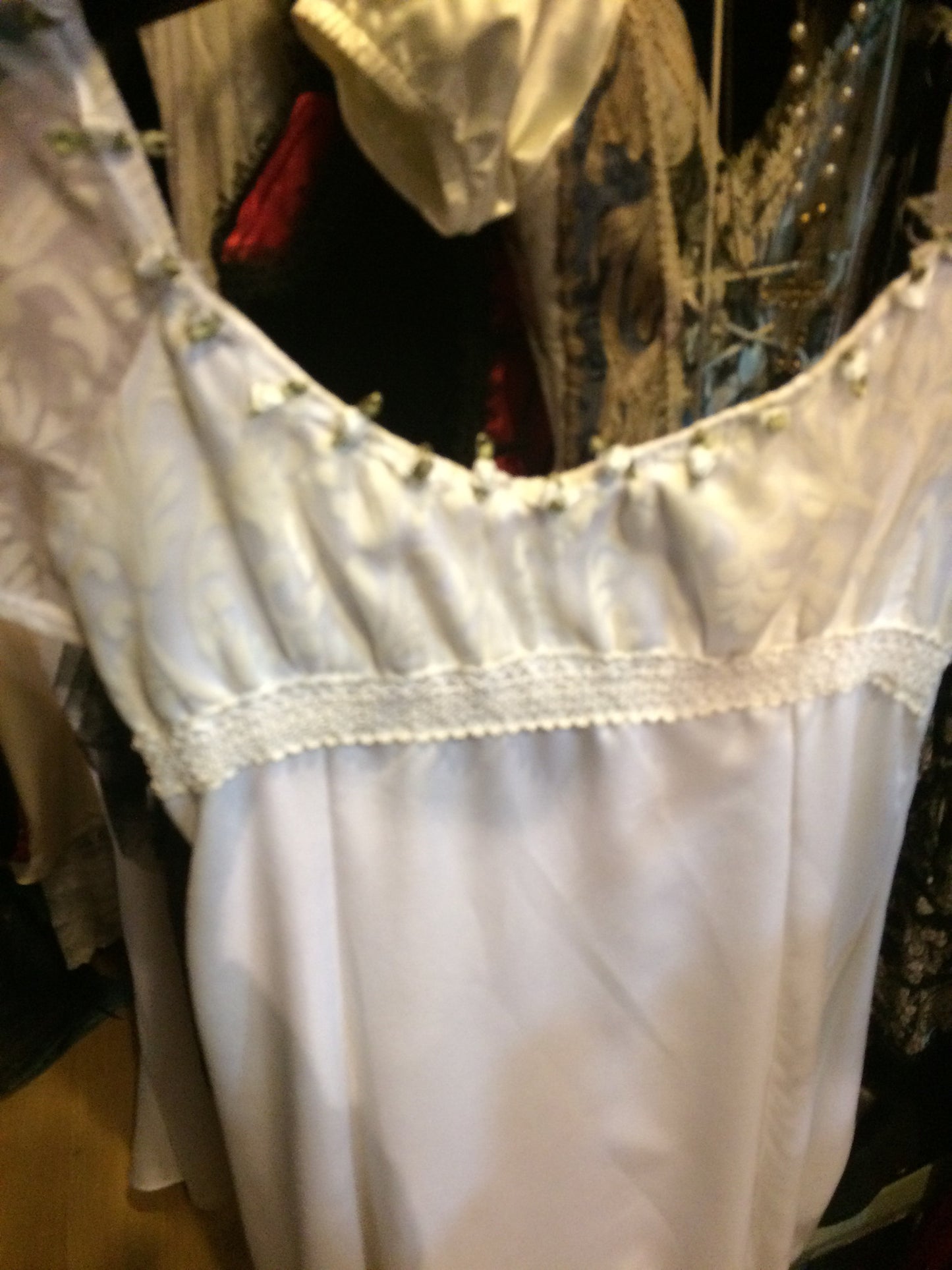 White gown green trim